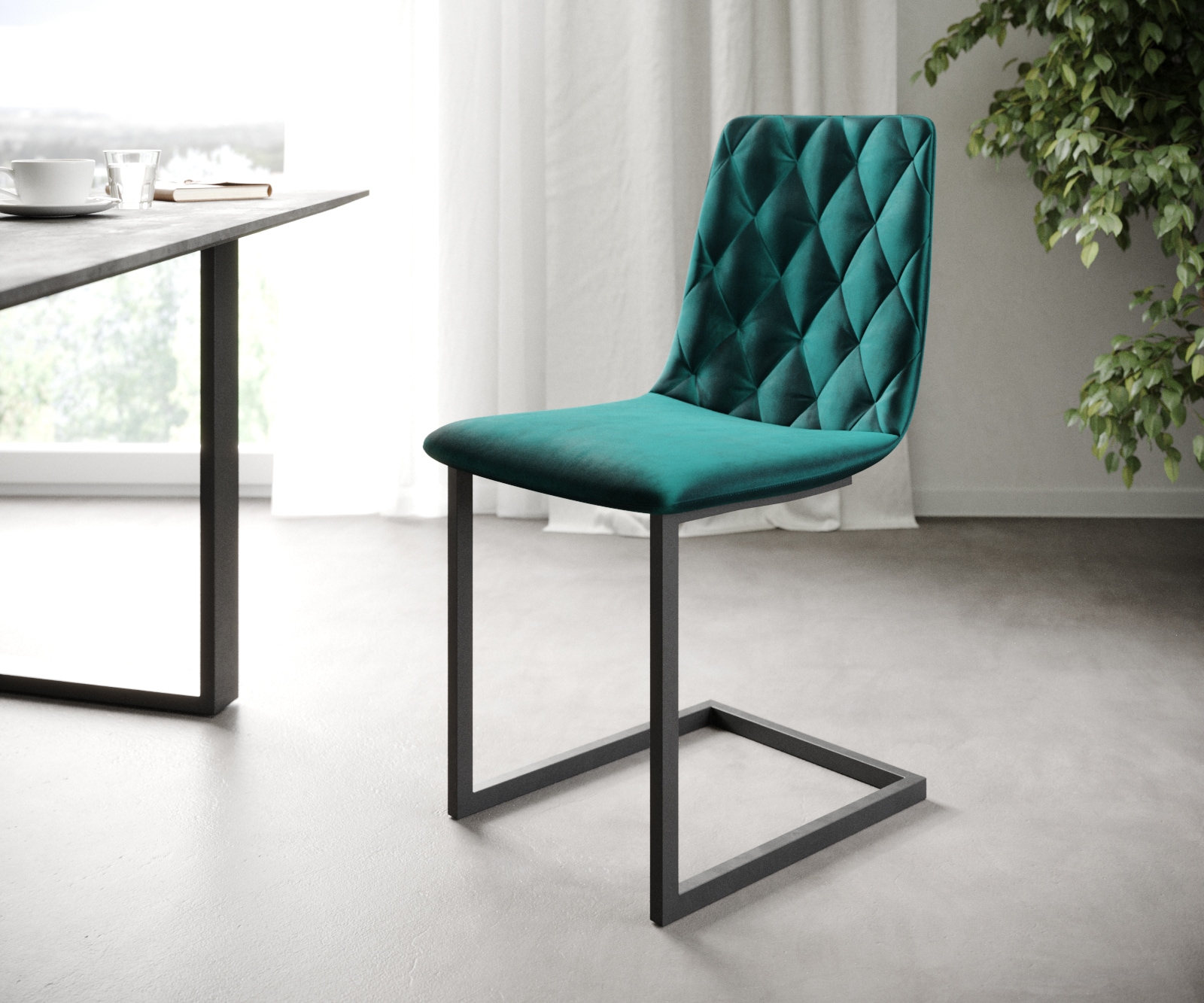 L'ensemble-de-4-chaises Trado-Adesso pétrole velours cantilever